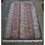 Persian design silk rug, with rows of trailing vine and boteh on ivory, blue, red and pistachio