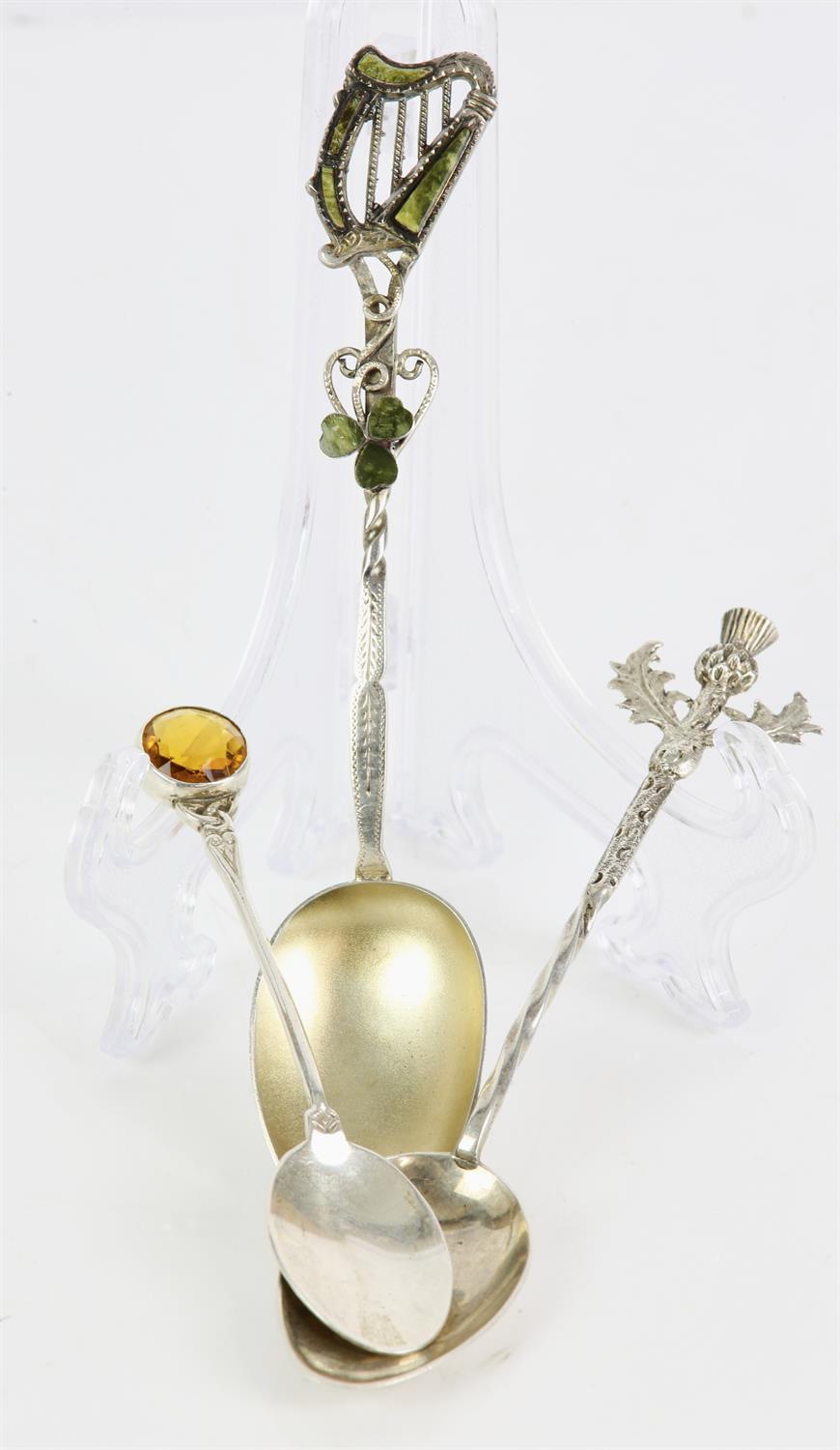 Irish theme stone set harp top, silver spoon, a thistle topped silver spoon, and a cabochon set