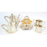Silver plate to include six egg cups on tray, teapot , coffee, milk and sugar, a ceramic ewer vase