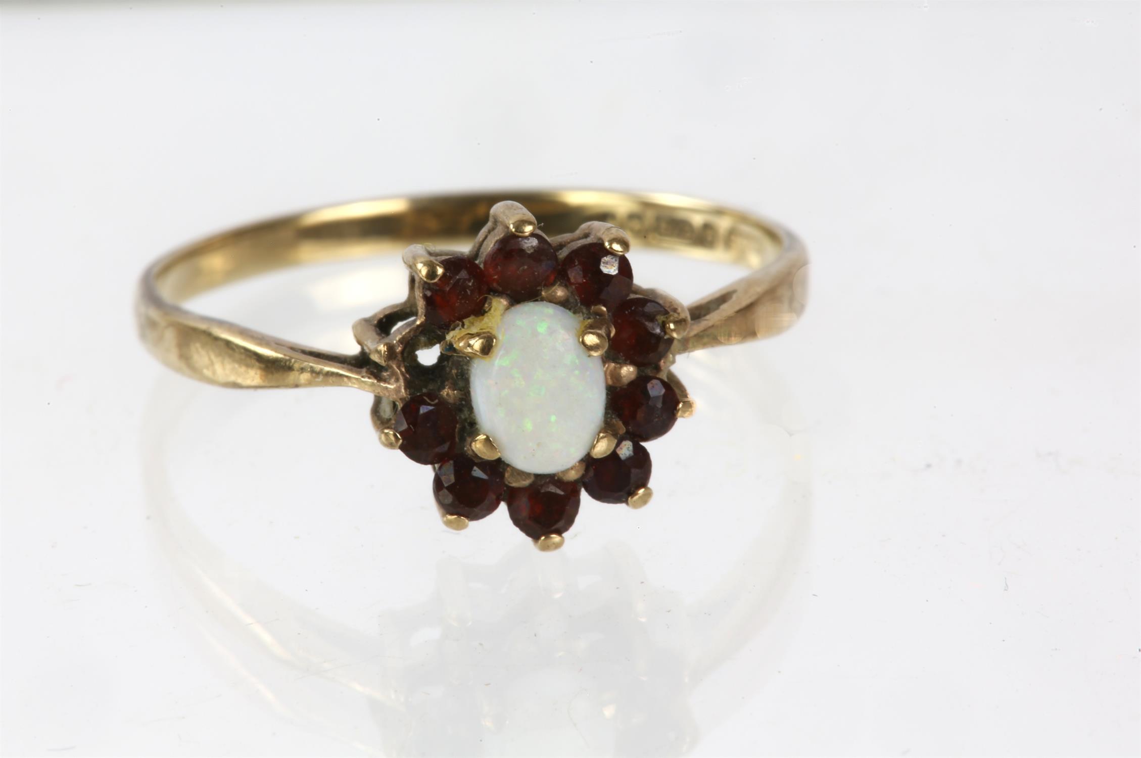 Opal and garnet cluster ring in stamped 9ct, ring size S, 1.9 grams
