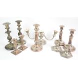 Selection of silver plated candlesticks and candelabra