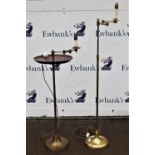 Brass extending library standard lamp, with a wooden tray circular stand, on domed base,