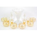 Glassware to include yellow glass bowls, clear glass candlesticks, dump weight, cut glass vase etc.