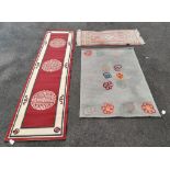 Two Chinese wool rugs, largest 158 x 94 cm, another two Chinese style rugs, and two modern European