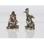 Two cast silver models of goblins, possibly chess pieces, 28 grams, London 1995