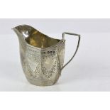 Victorian octagonal panel silver cream or milk jug with bright cut floral decoration by Robert