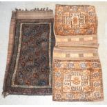 A set of saddlebags, woven with geometric motifs, brown, pale salmon and ochre hues, 120 x 56cm,