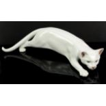 Large Royal Copenhagen porcelain cat, with a plain white glaze, numbered 059, 45cm L.
