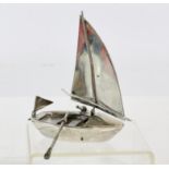Dutch silver model of a boat with detachable sail and moving oars, 69 grams