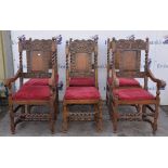 A set of six carved oak dining chairs, four plus two carvers. Foliate carved splats over solid seat