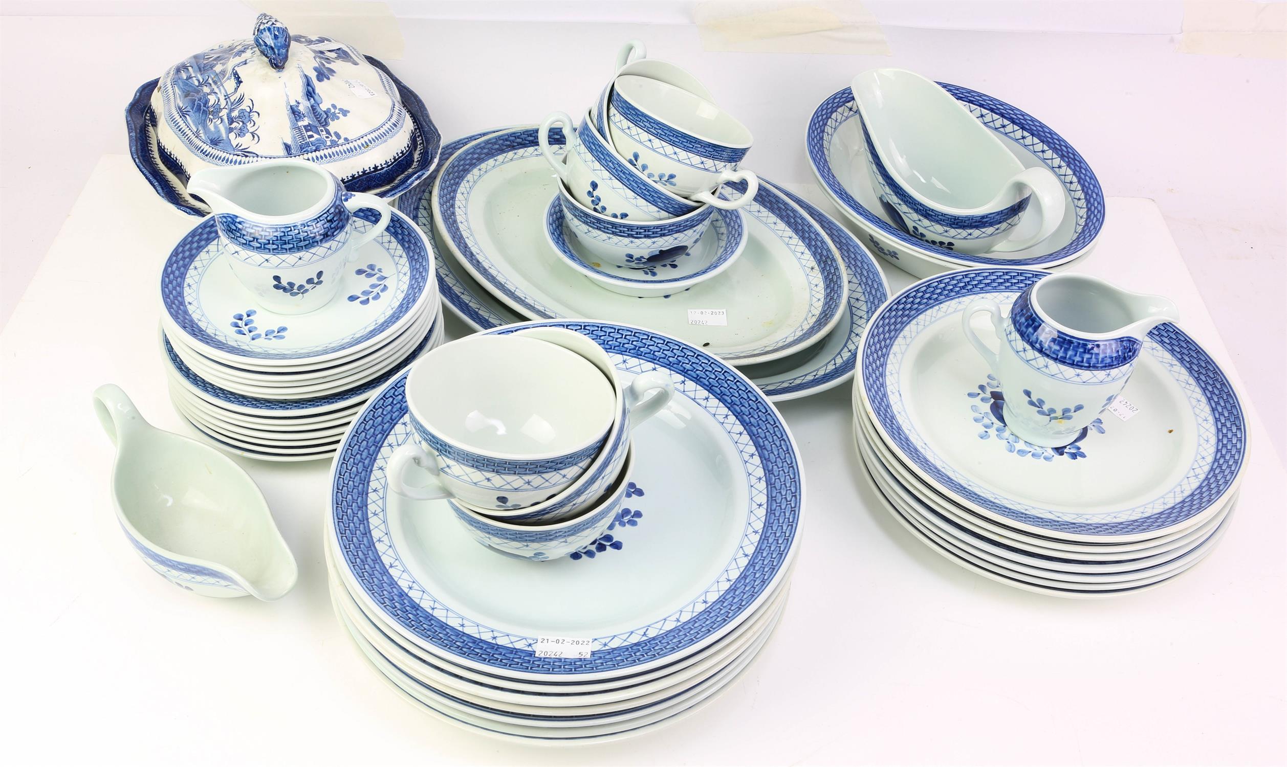 A Royal Copenhagen faience part dinner and tea service, decorated with blue and white flowers,