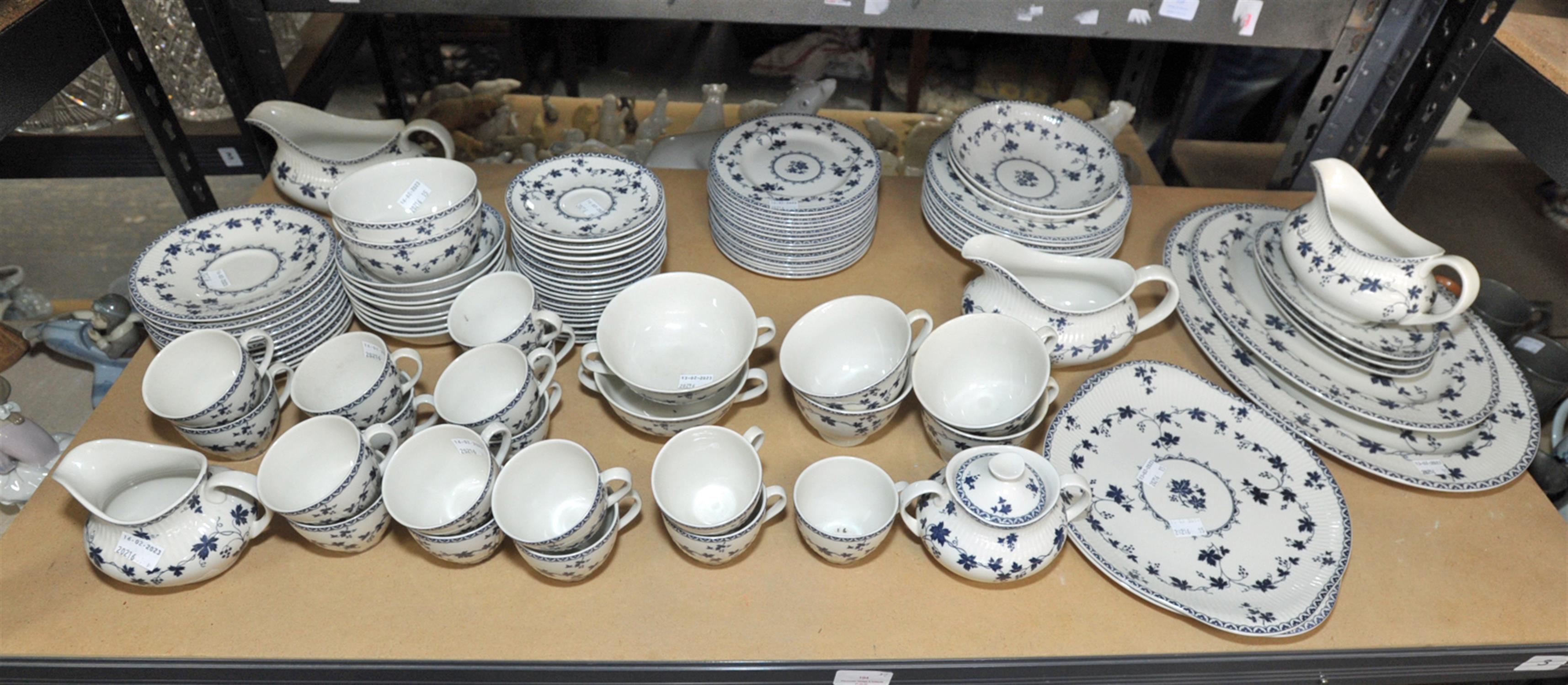 An extensive Royal Doulton 'Yorktown' dinner service, of twelve place settings, to include saucer