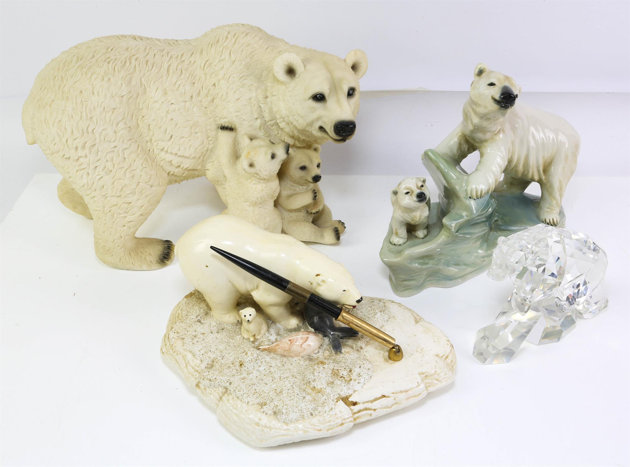 Doulton Carrara model of a polar bear, together with a collection of polar bear models,