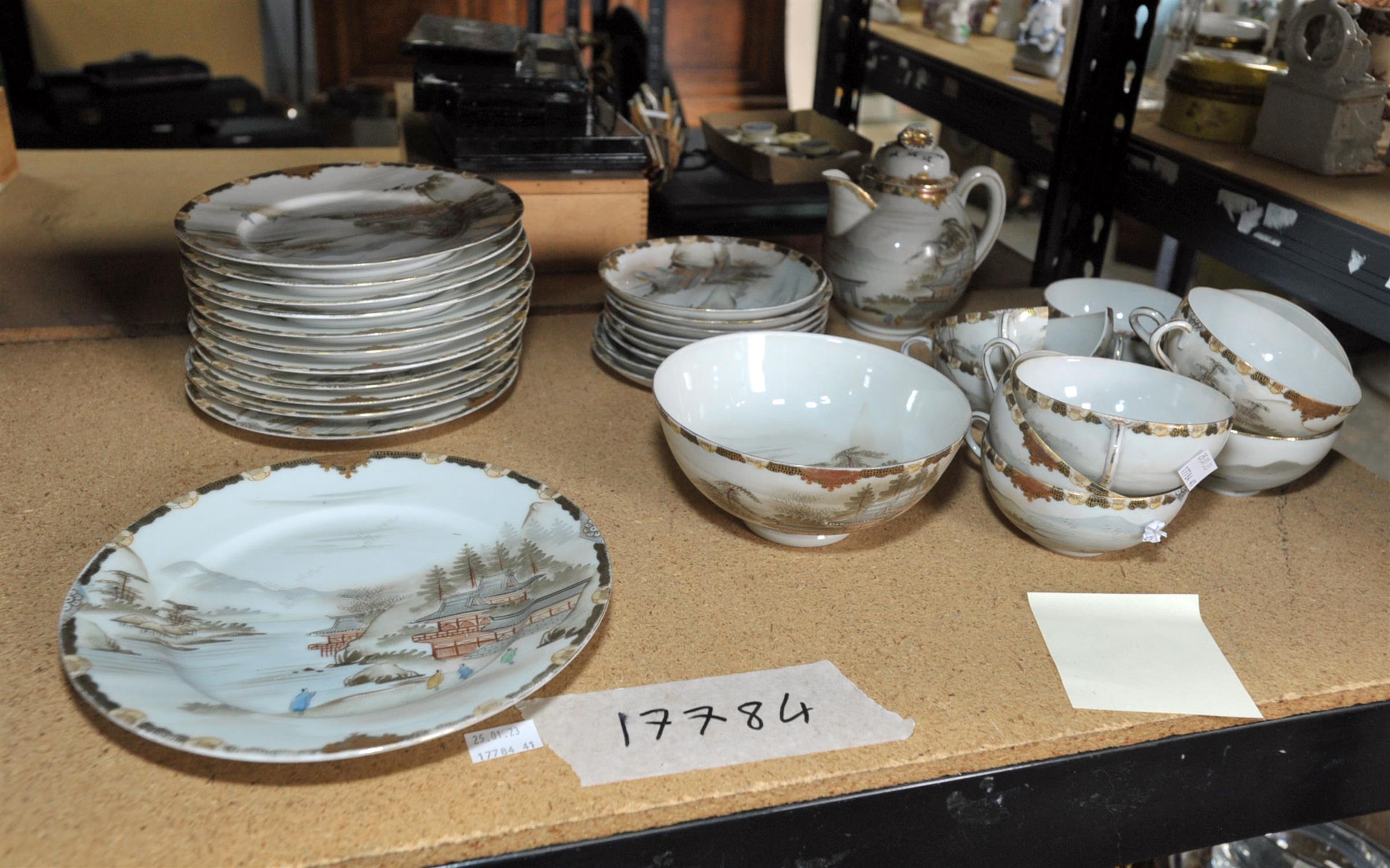 A Japanese early 20th Century tea service comprising of teapot tea cups, saucers,etc. Approx. - Image 2 of 2