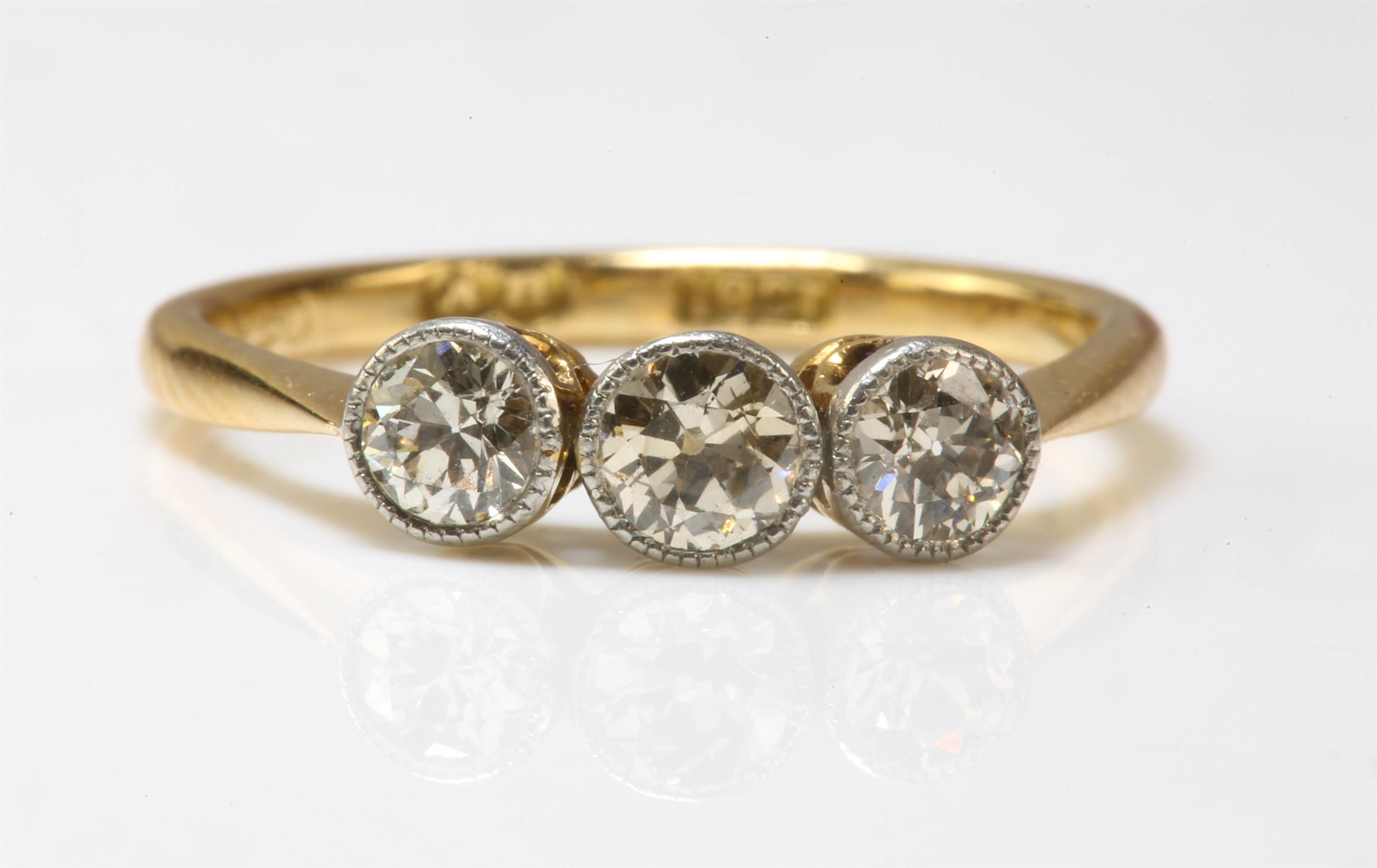 Edwardian three stone ring, set with three old European cut diamonds weighing an estimated total of