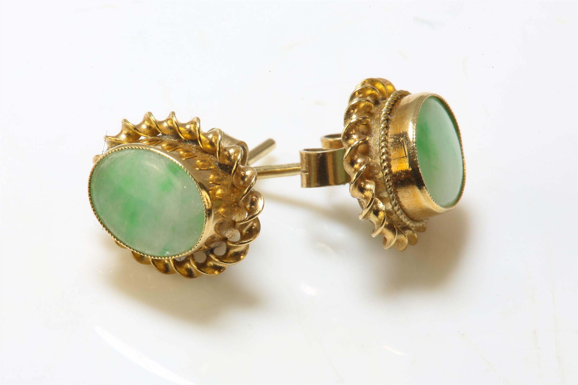 A pair of stamped 9ct yellow gold set earrings with oval jade to centre, post and butterfly fittings - Image 2 of 4