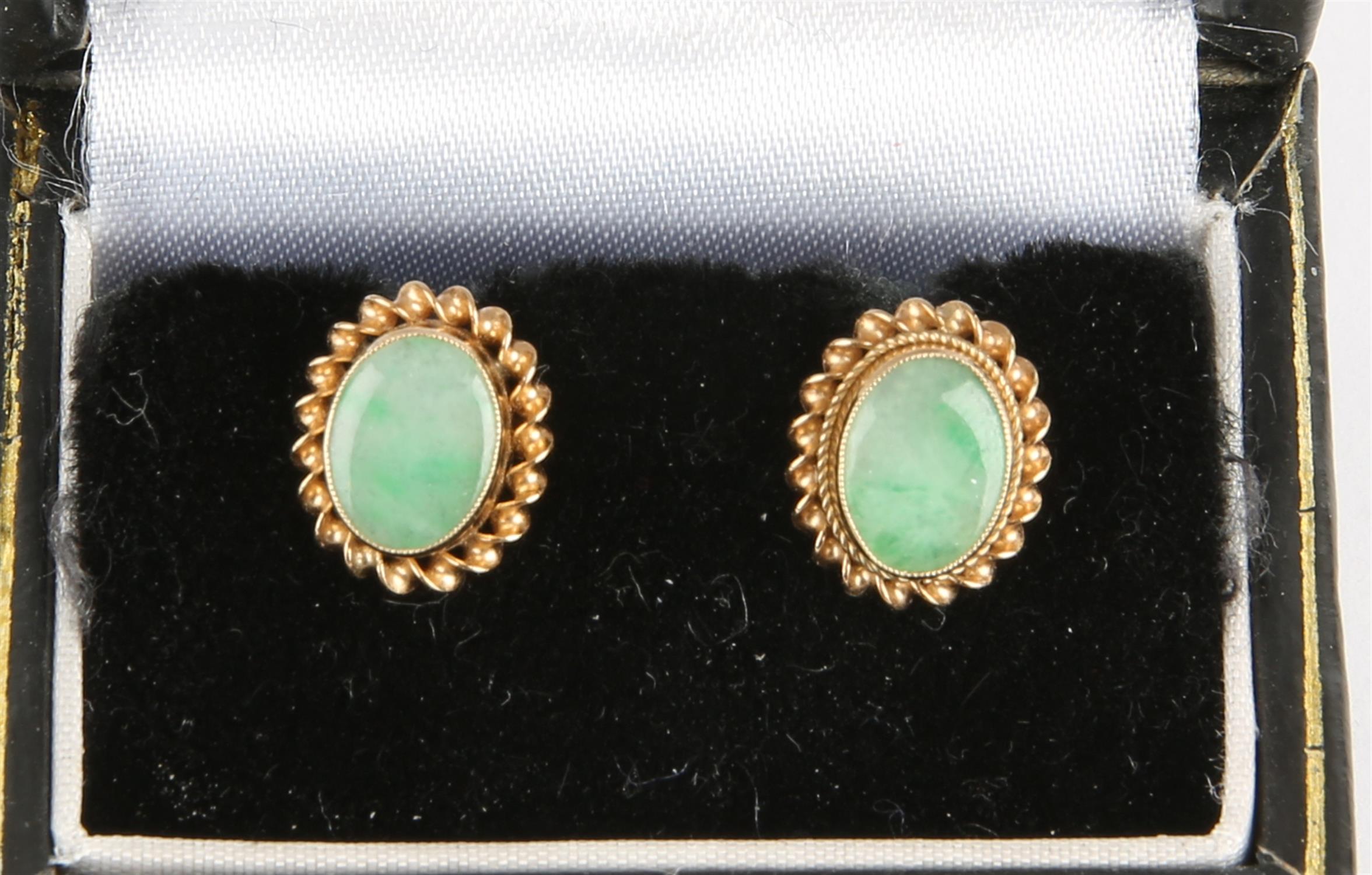 A pair of stamped 9ct yellow gold set earrings with oval jade to centre, post and butterfly fittings - Image 4 of 4
