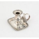 Small cast silver chamber stick with associated Victorian snuffer by James Barber,