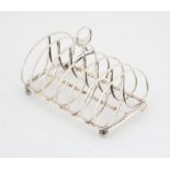 George III six division silver toast rack on ball feet, by John & Thomas Settle, Sheffield 1816, 8.