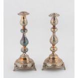 Pair of George. V. Sabbath candlesticks by Rosenzweig, Taitelbaum & Co London 1919 with one non