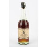 A Bottle of Cognac Roy De France 1865 Grande Reserve De L'Empire Fine Champagne Cognac