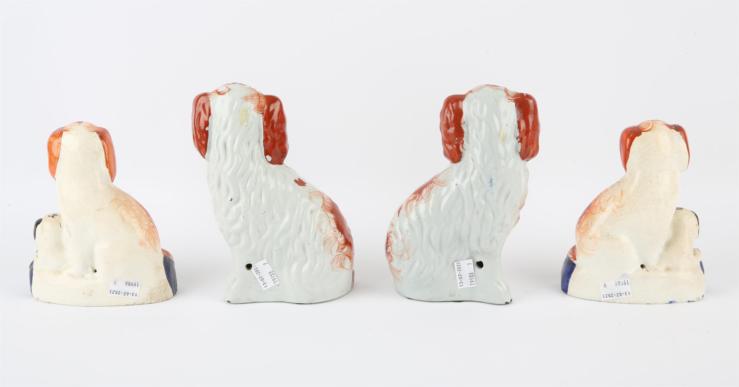 Pair of Staffordshire dogs, 19th Century, modelled seated, coloured with red splash decoration, - Image 2 of 2