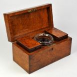 A 19th Century Burr Satinwood finished tea caddy, top opening to reveal twin tea caddies flanking