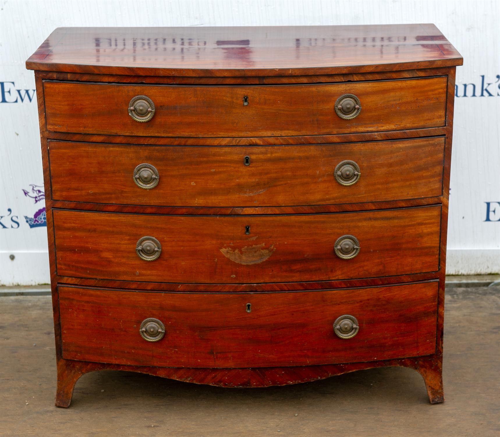 George III mahogany and line inlaid bowfront chest, the top drawer possibly later converted with a