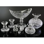 A group of Waterford glass, to comprise two lamp bases with glass shades, in two sizes,