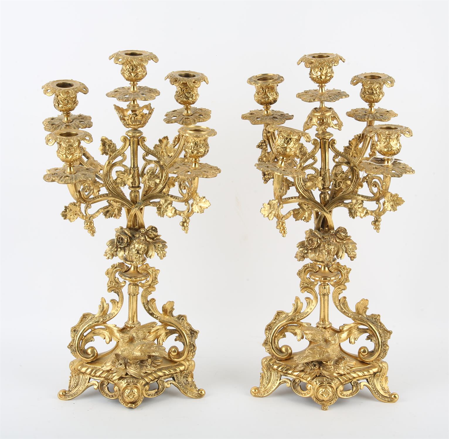 Pair of gilt metal five branch candelabra, 19th Century, with foliate decoration,