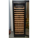 A Swiss Cave professional wine cooler cabinet, with fourteen beech racks, 180cm high x 59.