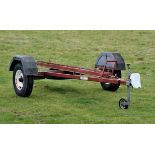 Motor Bike trailer, no light board present. PLEASE NOTE BUYERS PREMIUM AT THE STANDARD IN HOUSE