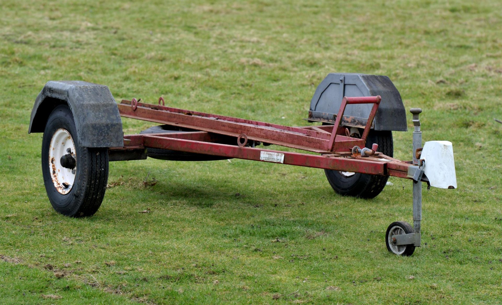 Motor Bike trailer, no light board present. PLEASE NOTE BUYERS PREMIUM AT THE STANDARD IN HOUSE