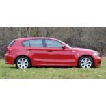 2007 BMW 116i 5 Door in red. Registration number LD57 WNZ - Economical and benefiting from the
