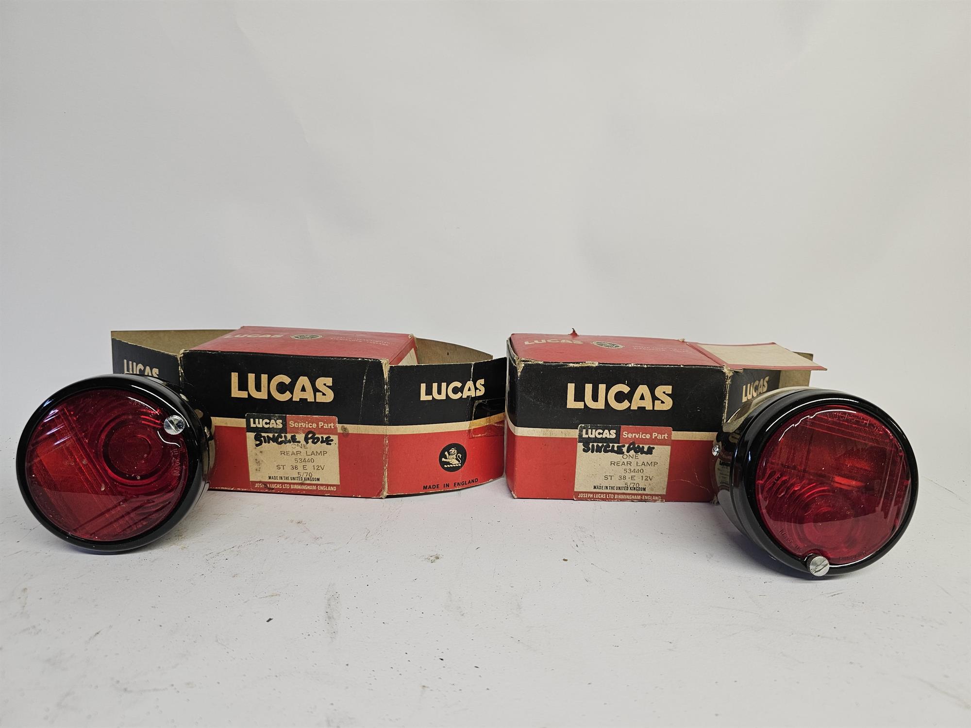 Lucas - Pair of Lucas light stone guard screen covers boxed, together with two Lucas red rear lamps