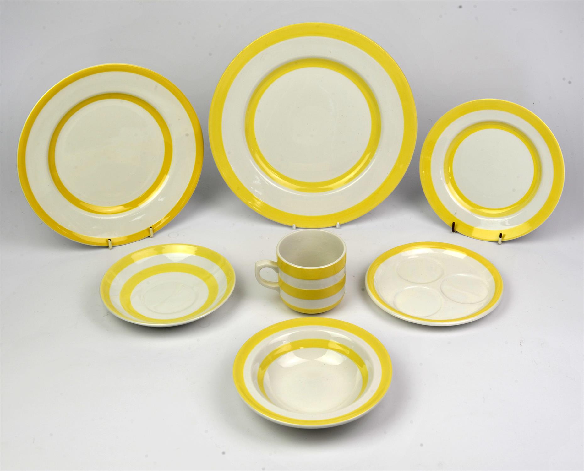 T.G. Green Cornish ware in yellow and white items include cups and saucers plates, bowls etc (94)