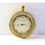 A compensated brass pocket barometer.