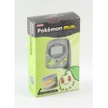 Pokémon Mini console (Chikorita Green) Factory Sealed. This lot contains a Pokémon Mini console