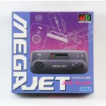 SEGA Mega Jet Boxed, New and Unused. The Sega Mega Jet was a handheld version of the Sega Mega