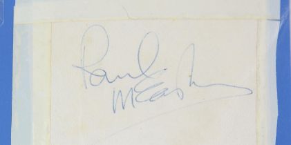 Paul McCartney (The Beatles) A vintage signed white page in blue biro, 9 x 10 cm.