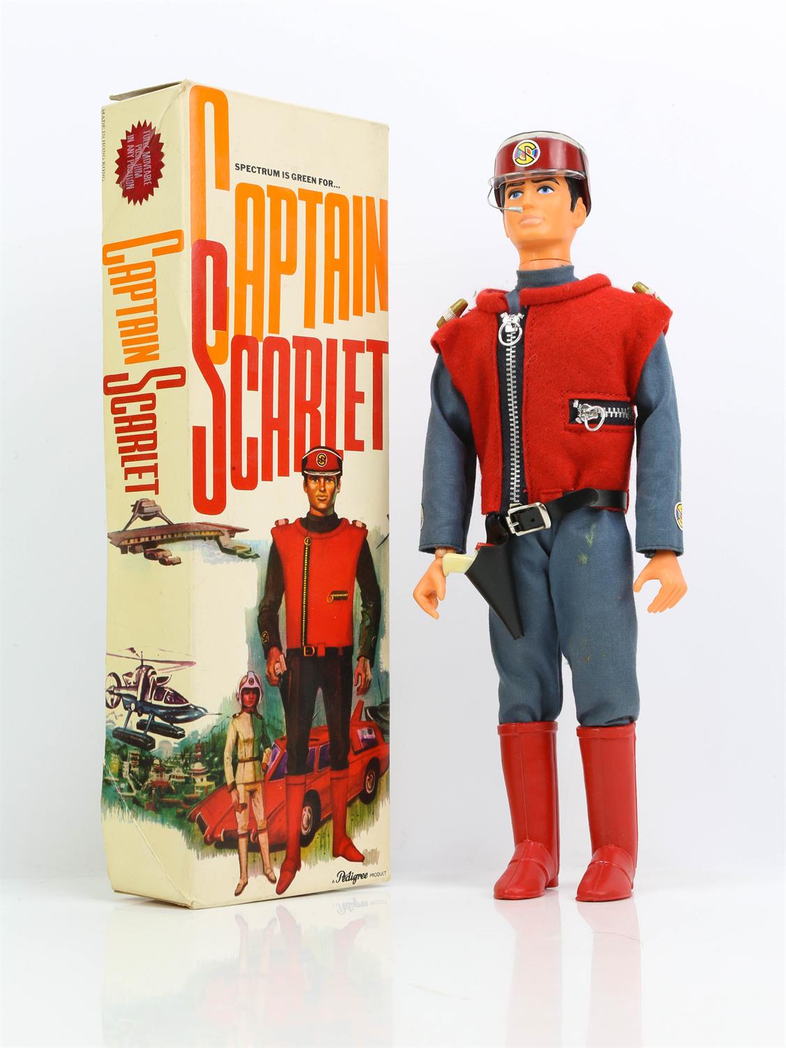 Pedigree Captain Scarlet Boxed in original box, with pistol red tunic and boots. Approx. 30cm high.