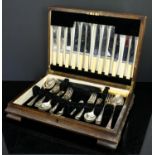 Canteen of cutlery in a wooden case.