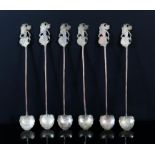 Set of six oriental/eastern white metal spoons with figural finials.
