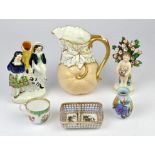 Two Victorian jugs, together with two Staffordshire figures, various porcelain cups and saucers,