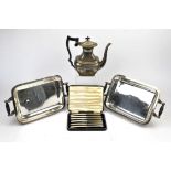 Pair of silver plated warming dishes with turned wood handles, cutlery and other items.