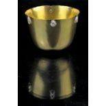 Sarah Jones, 18ct gold tumbler inset with six tear-drop aquamarines, Height 6cm Diameter 7cm, 88.7gm