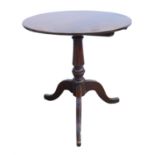 Mahogany tilt top circular table, 19th Century, on baluster stem, and tripod base,