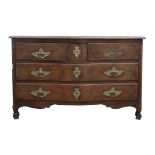 A French provincial serpentine front oak commode, 18th Century, with two short frieze drawers