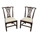 Pair of Chippendale style mahogany dining chairs, late 19th/20th Century, with pierced splats and