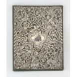 Green leather and silver mounted desk blotter, the cover embossed with cherubs amongst foliate